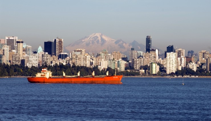 A shipping vessel sits at the mouth of False Creek, Vancouver